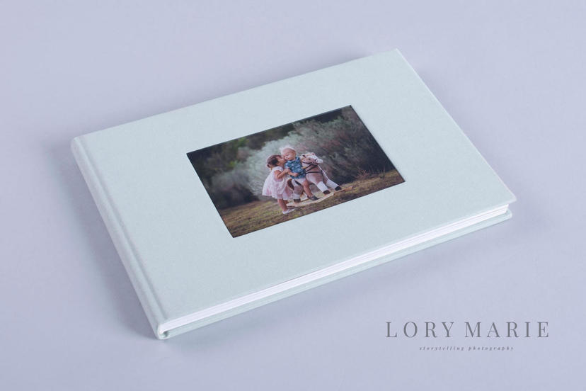 lay flat professionally printed Photo Album with hardcover nphoto professional photographer printing lab professional printing services nphoto cameo window cut out