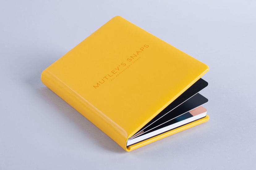 lay flat professionally printed yellow Photo Album with hardcover nphoto professional photographer printing lab professional printing services nphoto